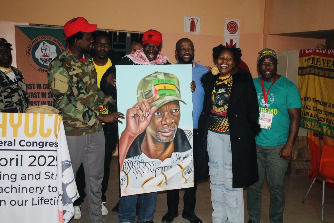PUDEMO Youth League presents veteran leader Mphandlana Shongwe with a portrait in recognition of his unwavering commitment to the struggle for democracy in eSwatini.