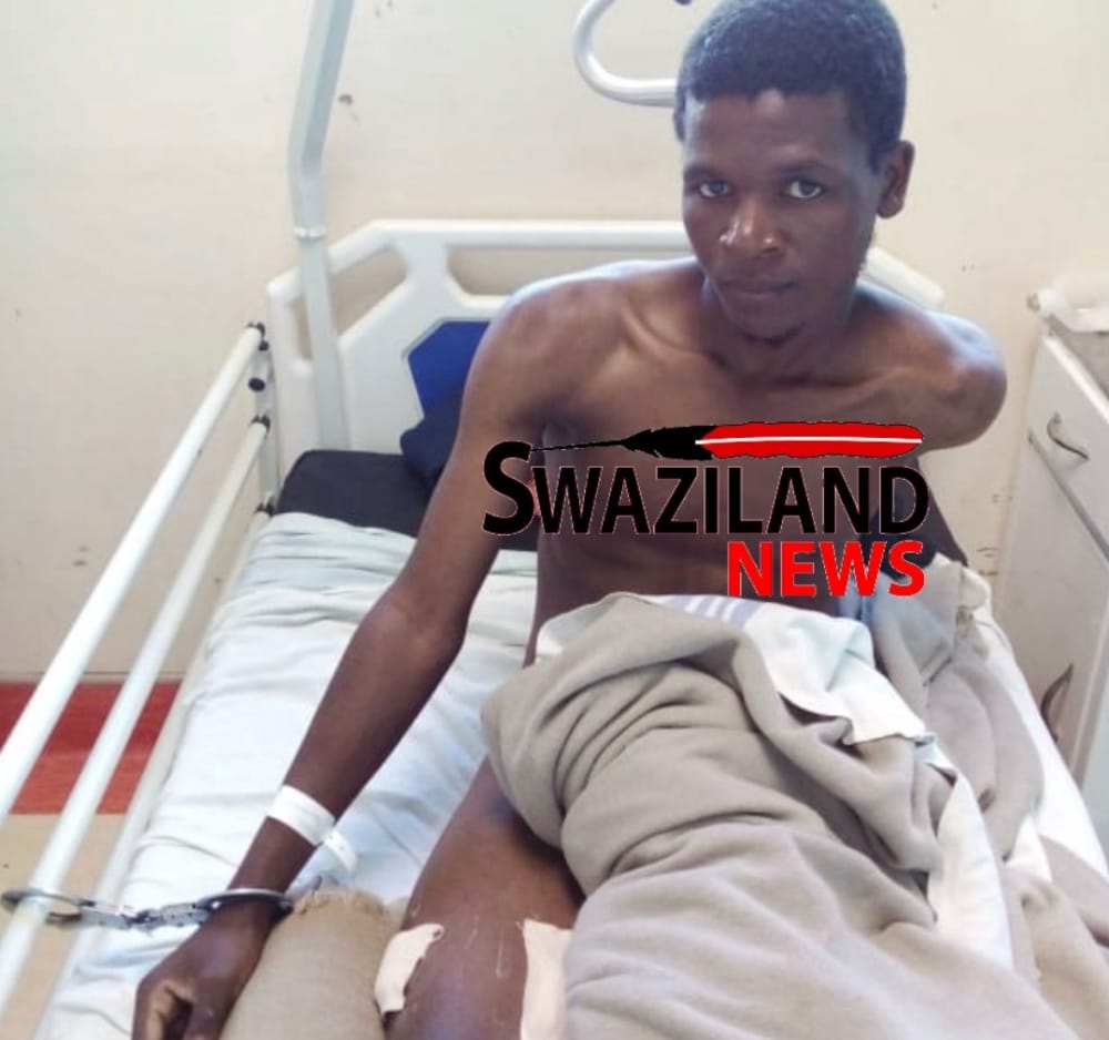 EXPOSED: Police shoots suspect Mehluli Khumalo handcuffs him onto RFM hospital bed.