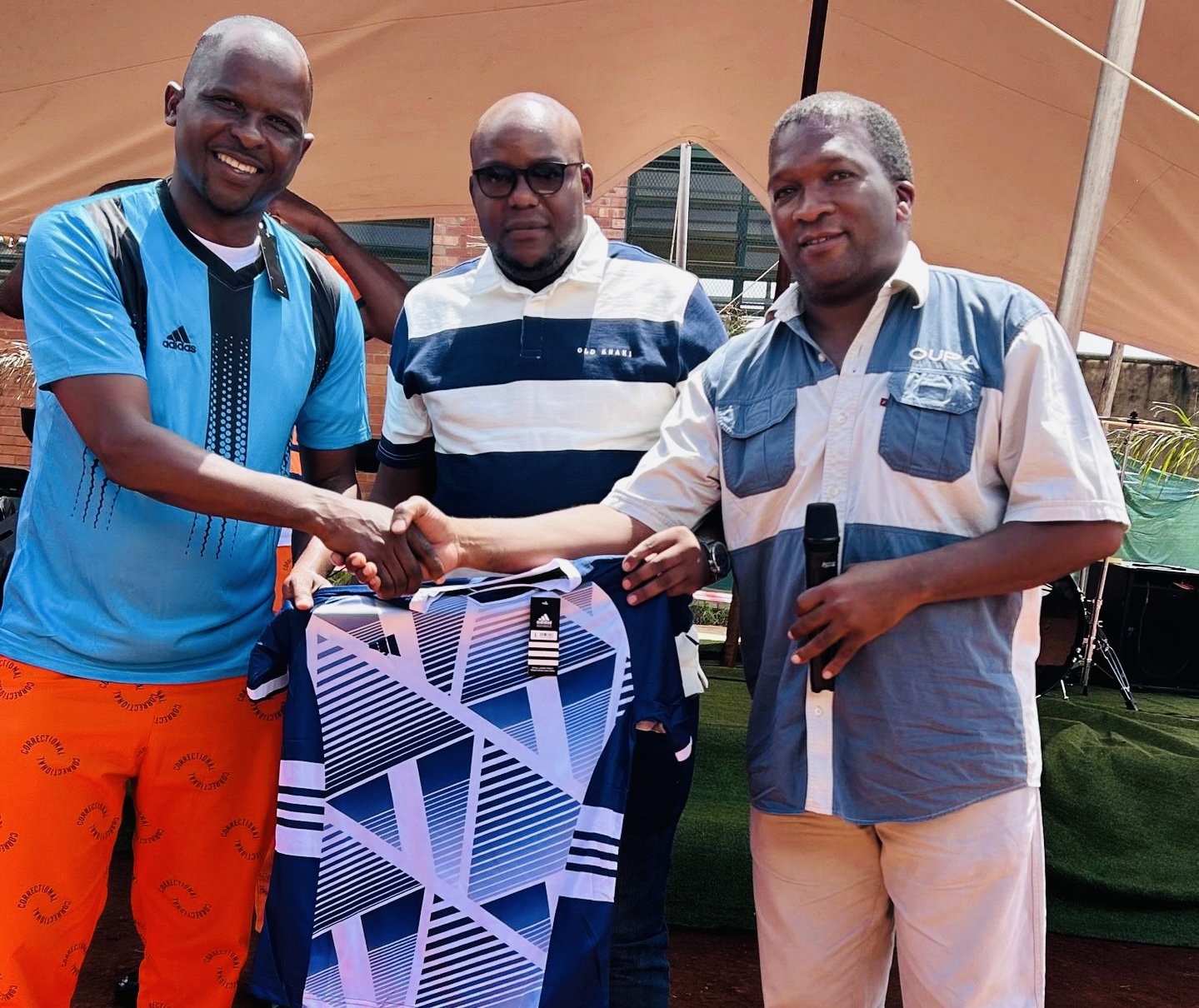 Deputy Speaker Madala Mhlanga, Kwaluseni MP Sifiso Shongwe donate soccer kits to Matsapha Correctional Services inmates soccer team.