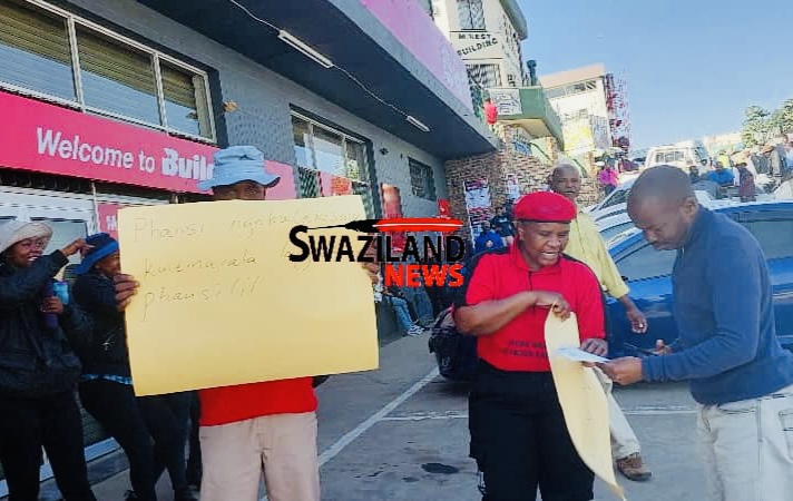 Built it Manzini employing workers on short-term contracts,employees engage in a strike action demanding full-time employment.