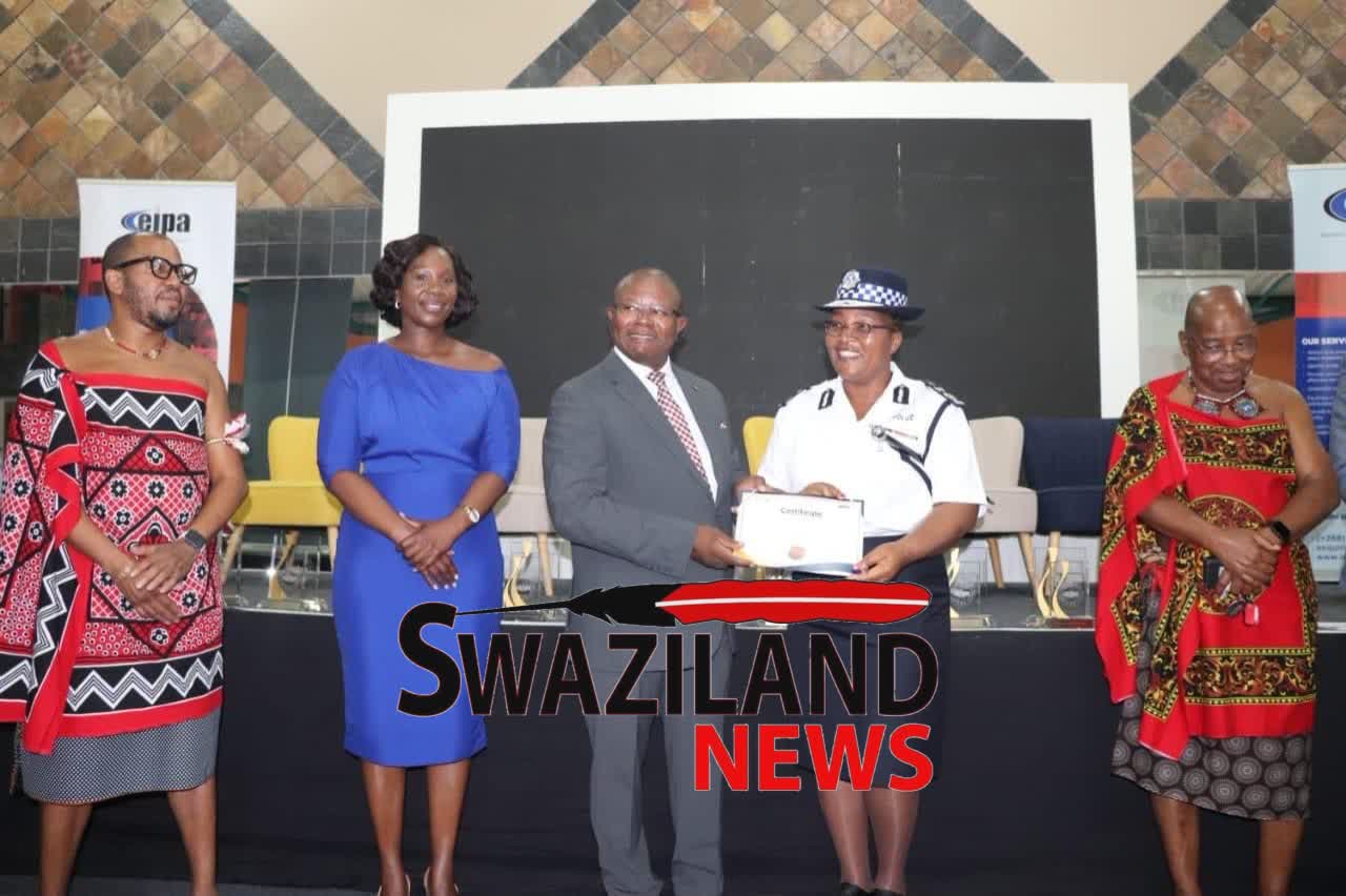 Royal Eswatini Police Service(REPS) wins best Government Ministry Trade Fair Award, newly appointed Deputy Commissioner Wendy Hleta accepts prize.
