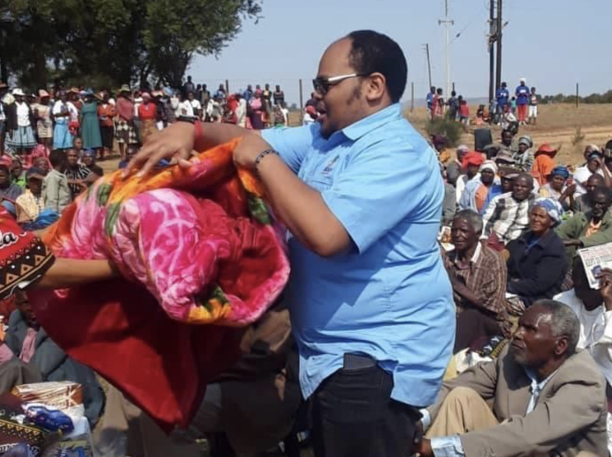 Prince Sicalo donates food parcels, blankets to needy Hhukwini elderly.