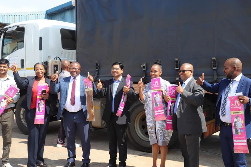 Commerce Minister Mancoba Khumalo visits Ngwenya Haircare company to witness first truckload of finished products.