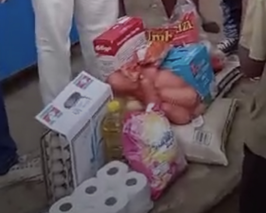 Pro-democracy MPs’ lawyer donates R4000.00, grocery to a toddler who survived a teargas fired by Mswati’s police.