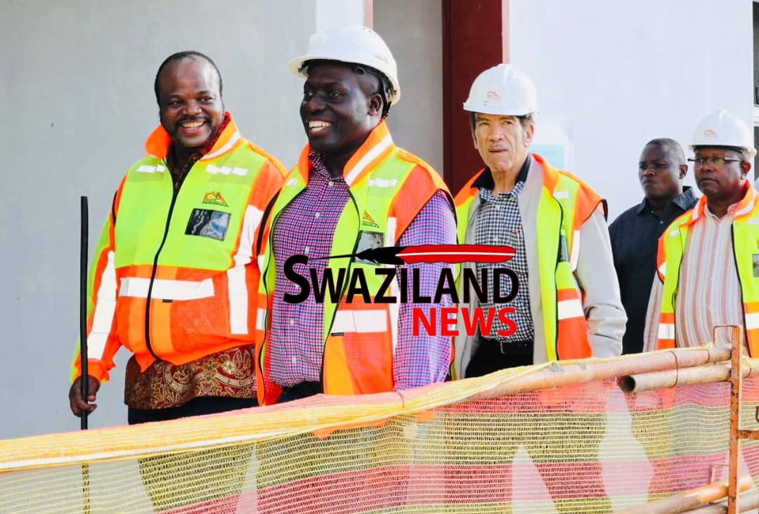 King Mswati smiles with Inyatsi Group boss Michello Shakantu as he tours under-construction Hotel at fast developing Hlane Town.
