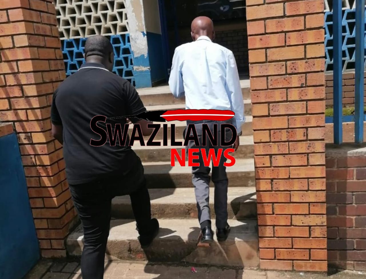 Lawyer accompanies Students President Colani Maseko to Manzini Police Station to report State plot to assassinate him.