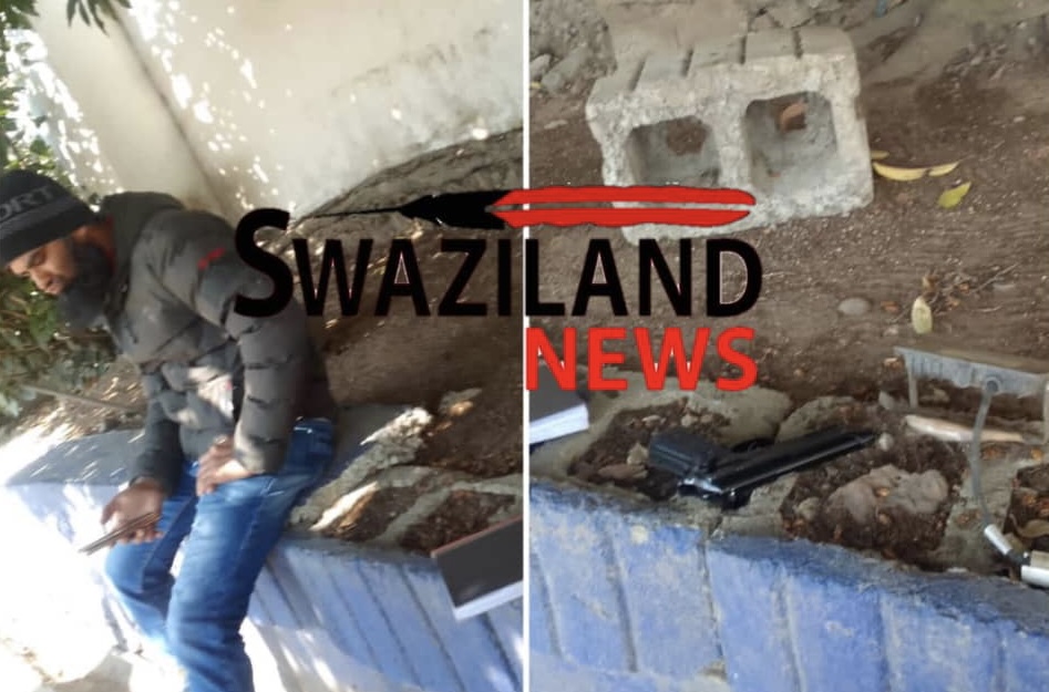 Asian produces gun to intimidate protesting Unifoods workers.