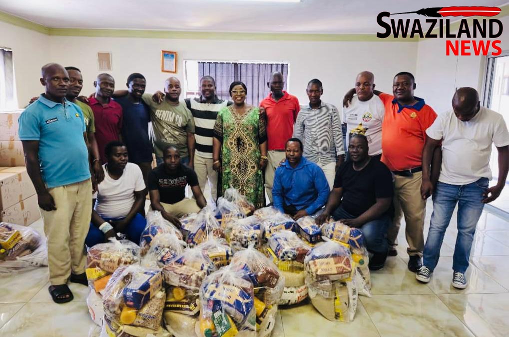 ShopRite Eswatini Director Sylvia Mthethwa donates food hampers to taxi drivers,Manzini women vendors as Christmas gifts.